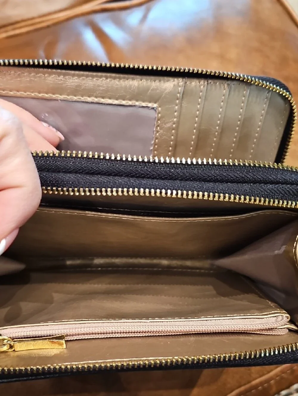 Anne Klein Black Pebbled Zip-Around Wallet with Gold Emblem